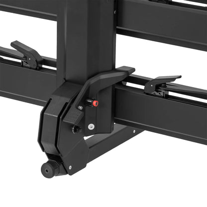 Close-up of the Kuat Piston ION pivot lock on a white background