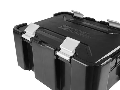 Black Front Runner Wolf Pack Pro with a silver latch on a white background